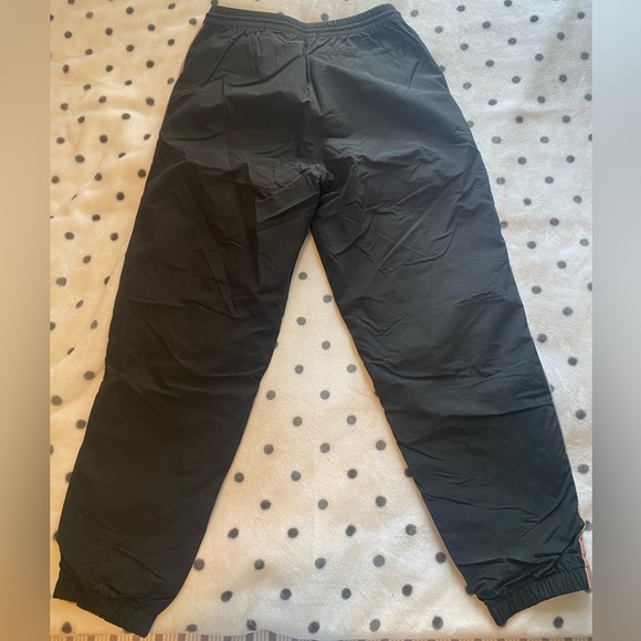 Urban Outfitters black with pink stripe pants size medium. - Picture 2 of 3